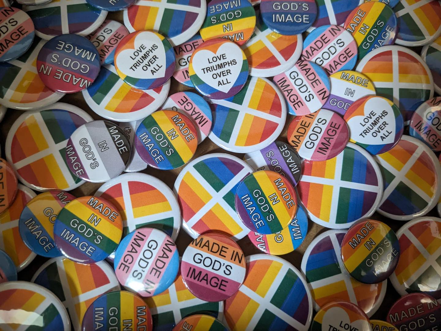 Pride Rainbow Button Badges with the LGBTQ Sunday Logo and the text Made In God's Image
